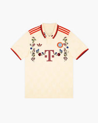 Bayern Munich hand-embroidered football shirt in cream / red, front view — CRID