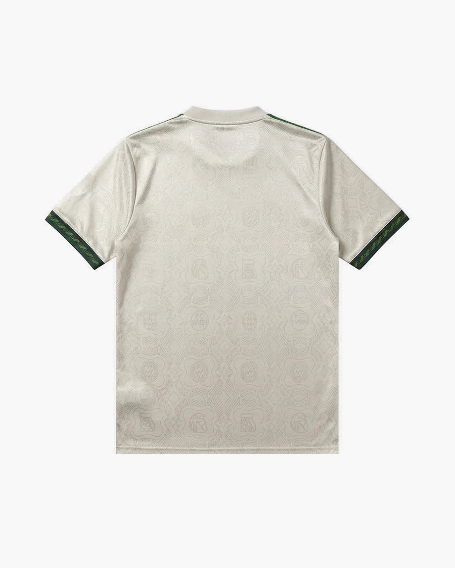 Bayern Munich hand-embroidered football shirt in beige / green, back view — CRID