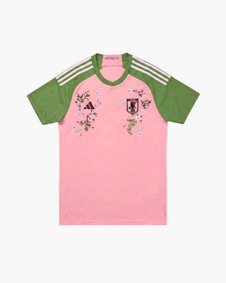 Japan hand-embroidered football shirt in pink / green, front view — CRID