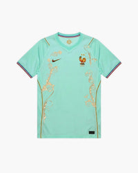 France hand-embroidered football shirt in mint / green / gold, front view — CRID