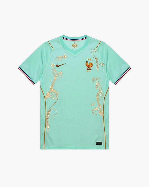 France hand-embroidered football shirt in mint / green / gold, front view — CRID