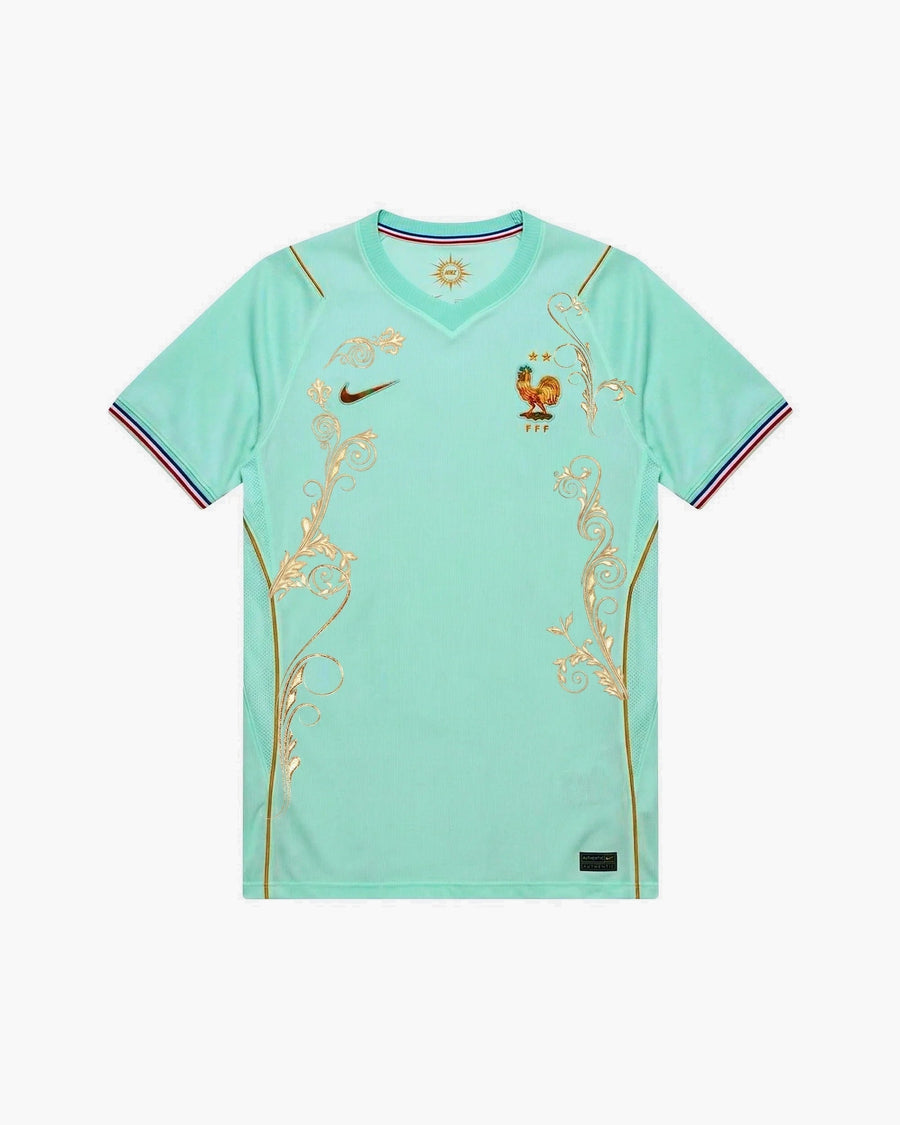 France hand-embroidered football shirt in mint / green / gold, front view — CRID
