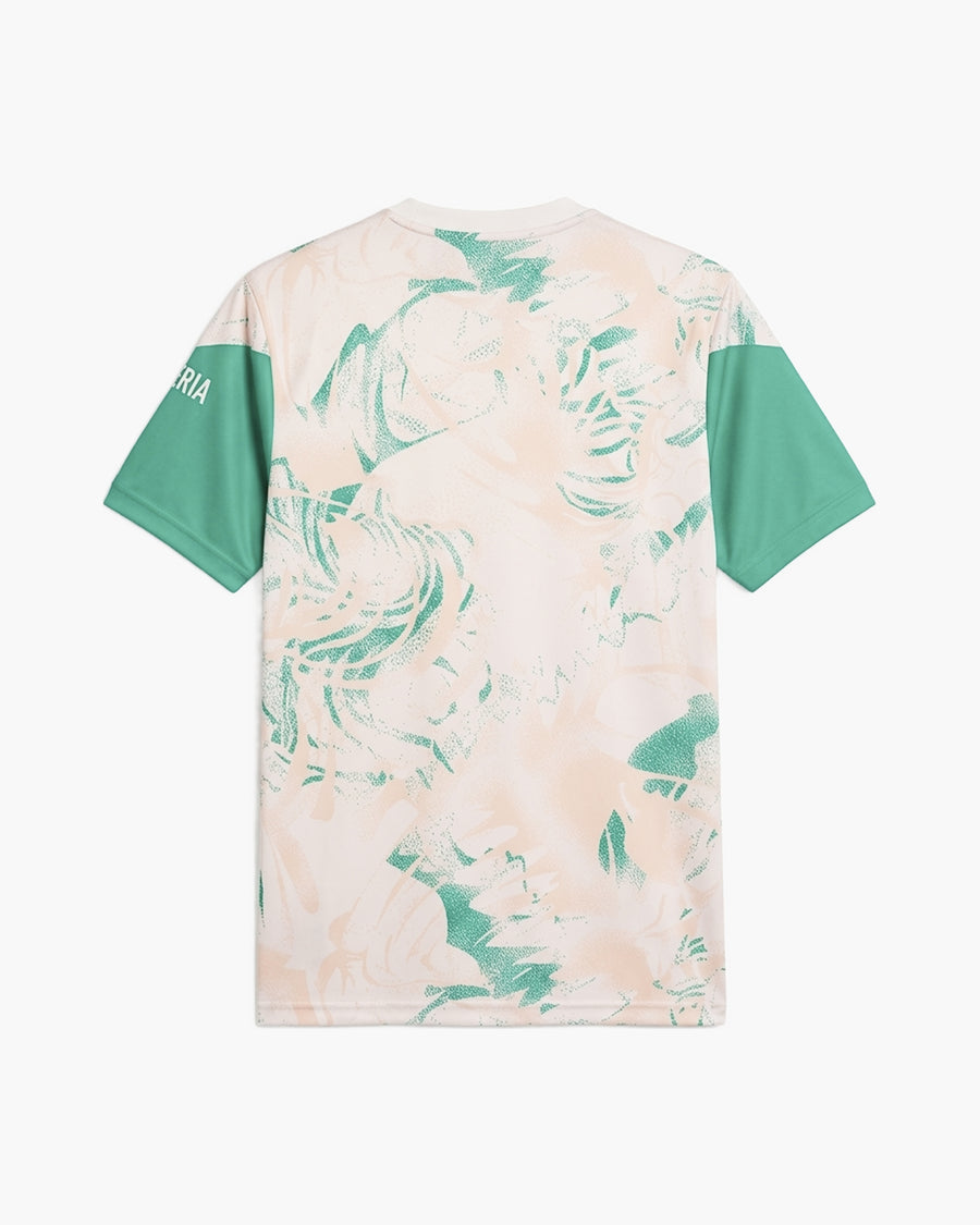 Algeria 2026 pre-match football shirt, light beige with a green and peach all-over print and green sleeves, back view, blank for name and number — CRID