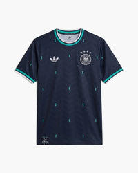 Germany 2026 away football shirt by adidas Originals, navy with turquoise diamonds, the DFB crest with four stars and the trefoil, front view — CRID
