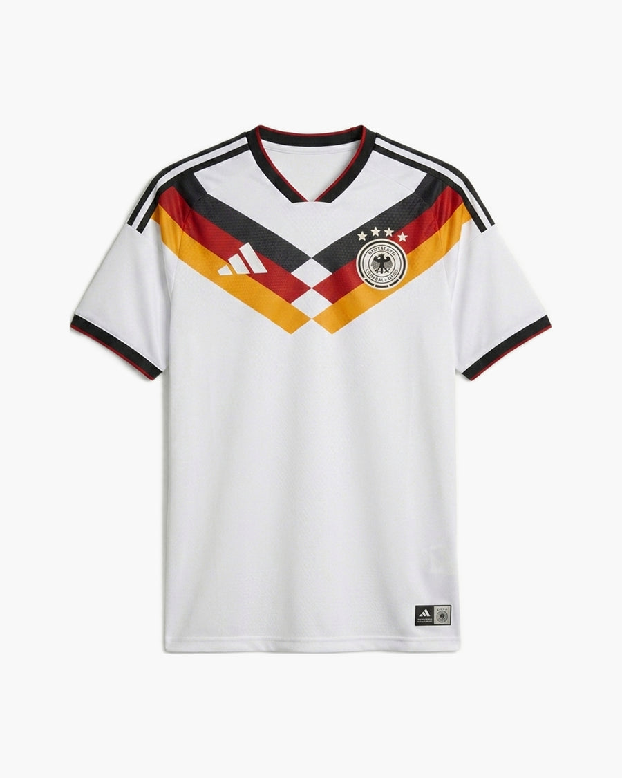 Germany 2026 home football shirt by adidas, white with a black, red and gold chevron across the chest, the DFB crest with four stars and the adidas logo, front view — CRID