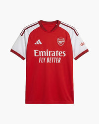 Arsenal 2026/27 home football shirt by adidas, scarlet red with white raglan sleeves and dark red three stripes, the adidas logo, the Arsenal cannon crest and the Emirates Fly Better wordmark, front view — CRID