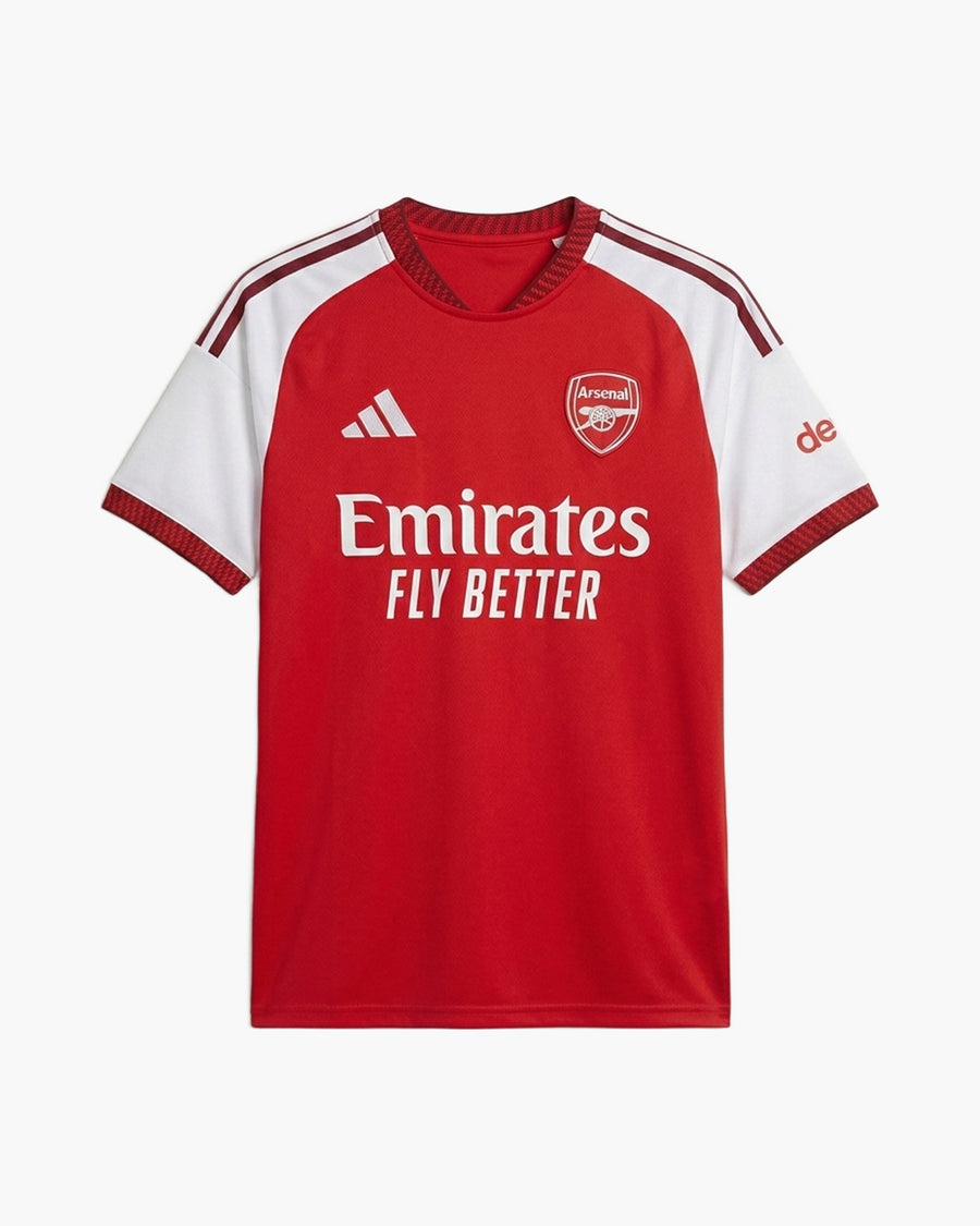 Arsenal 2026/27 home football shirt by adidas, scarlet red with white raglan sleeves and dark red three stripes, the adidas logo, the Arsenal cannon crest and the Emirates Fly Better wordmark, front view — CRID