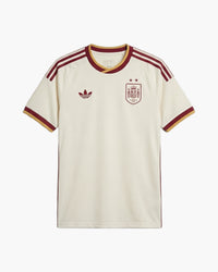 Spain 2026 away football shirt in off white with burgundy and gold trim, adidas Originals trefoil and RFEF crest, front view — CRID