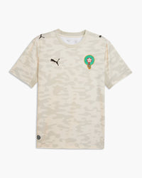Morocco 2026 goalkeeper shirt, Puma × Salehe Bembury, beige tonal camouflage with the FRMF crest, front view — CRID