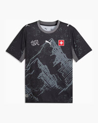 Switzerland 2026 goalkeeper shirt, PUMA x Salehe Bembury, black with a grey print of the Swiss Alps, cool dark grey panels, the ASF/SFV crest and the Swiss cross, front view — CRID