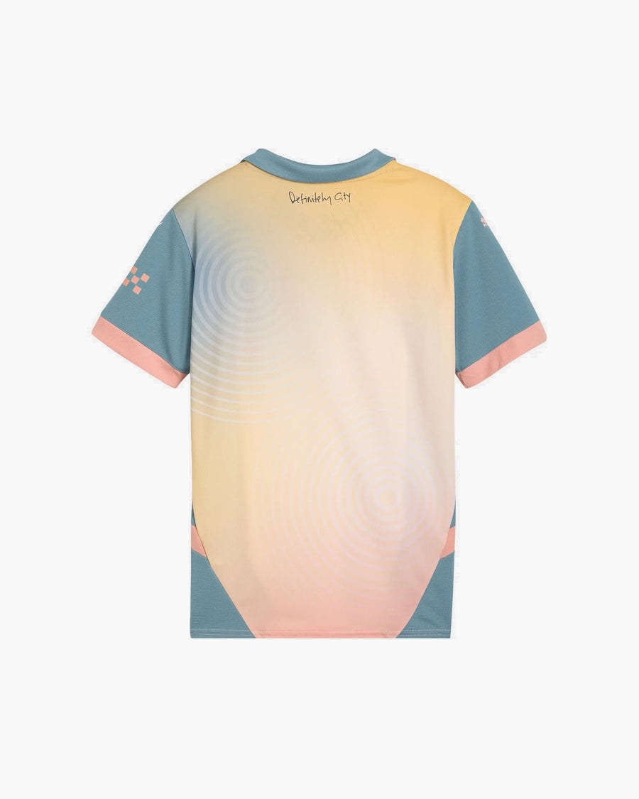 Manchester City hand-embroidered football shirt in blue / peach, back view — CRID
