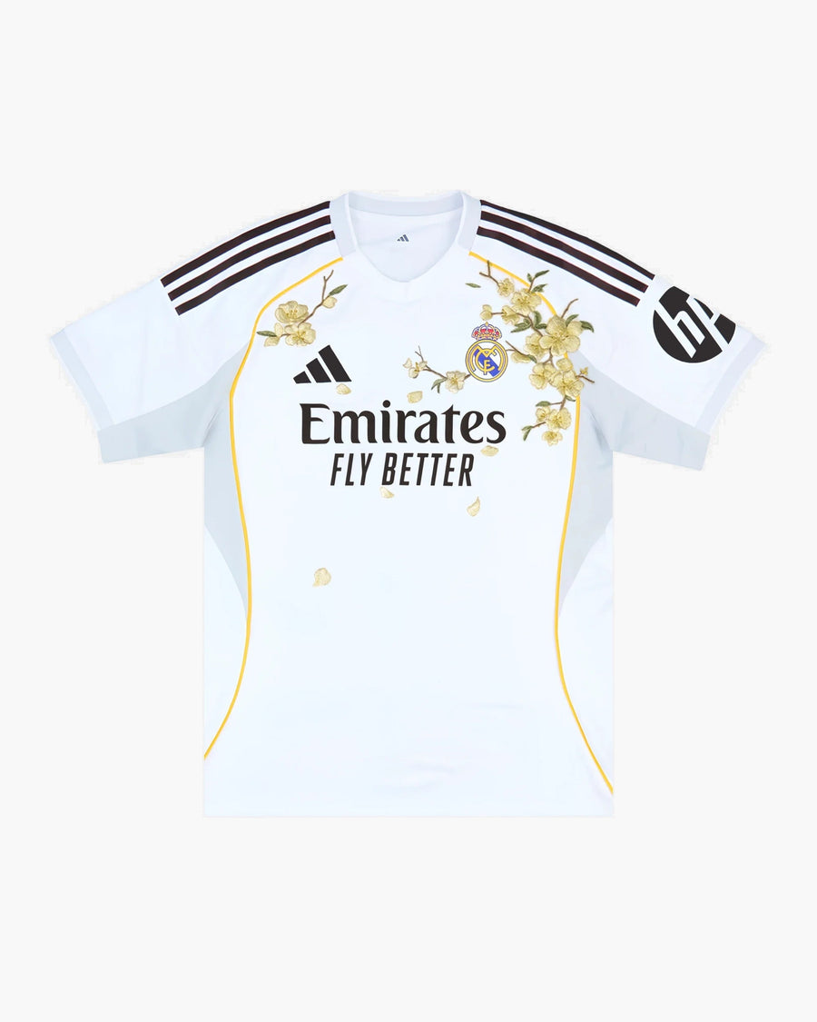 Real Madrid hand-embroidered football shirt in white / gold, front view — CRID