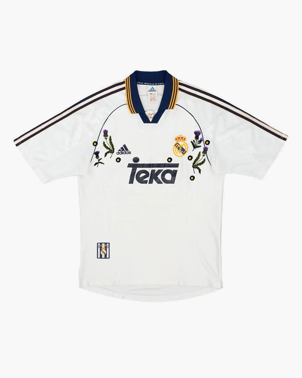 Real Madrid hand-embroidered football shirt in white / navy, front view — CRID