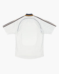 Real Madrid hand-embroidered football shirt in white / navy, back view — CRID