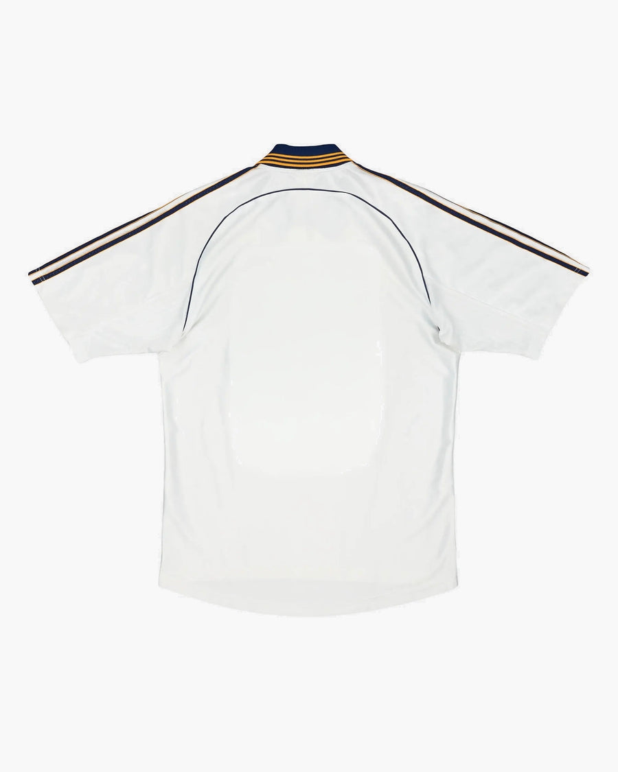 Real Madrid hand-embroidered football shirt in white / navy, back view — CRID