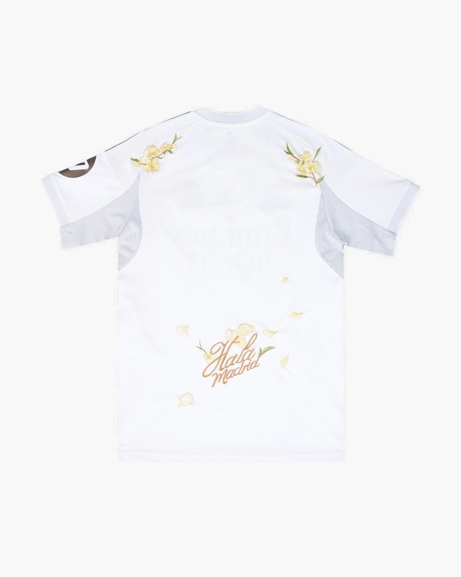 Real Madrid hand-embroidered football shirt in white / gold, back view — CRID