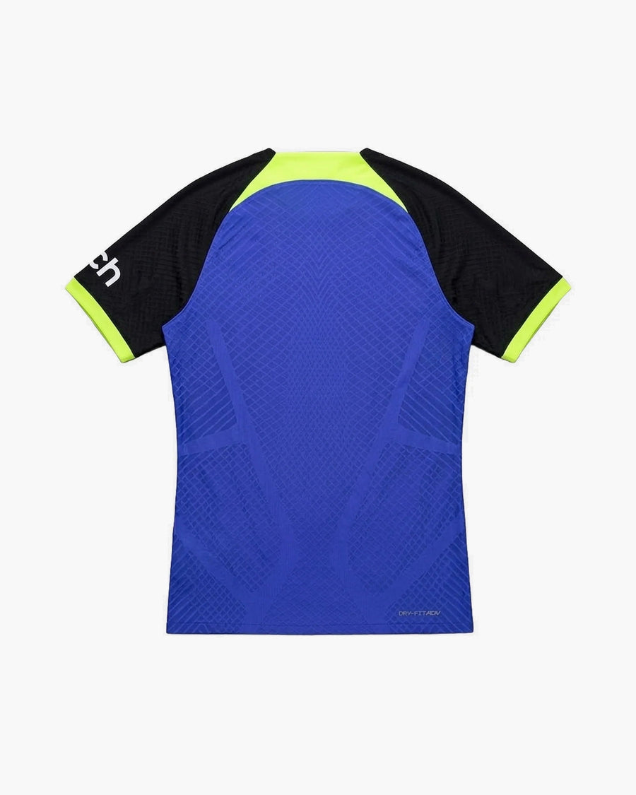 Tottenham hand-embroidered football shirt in blue / black, back view — CRID