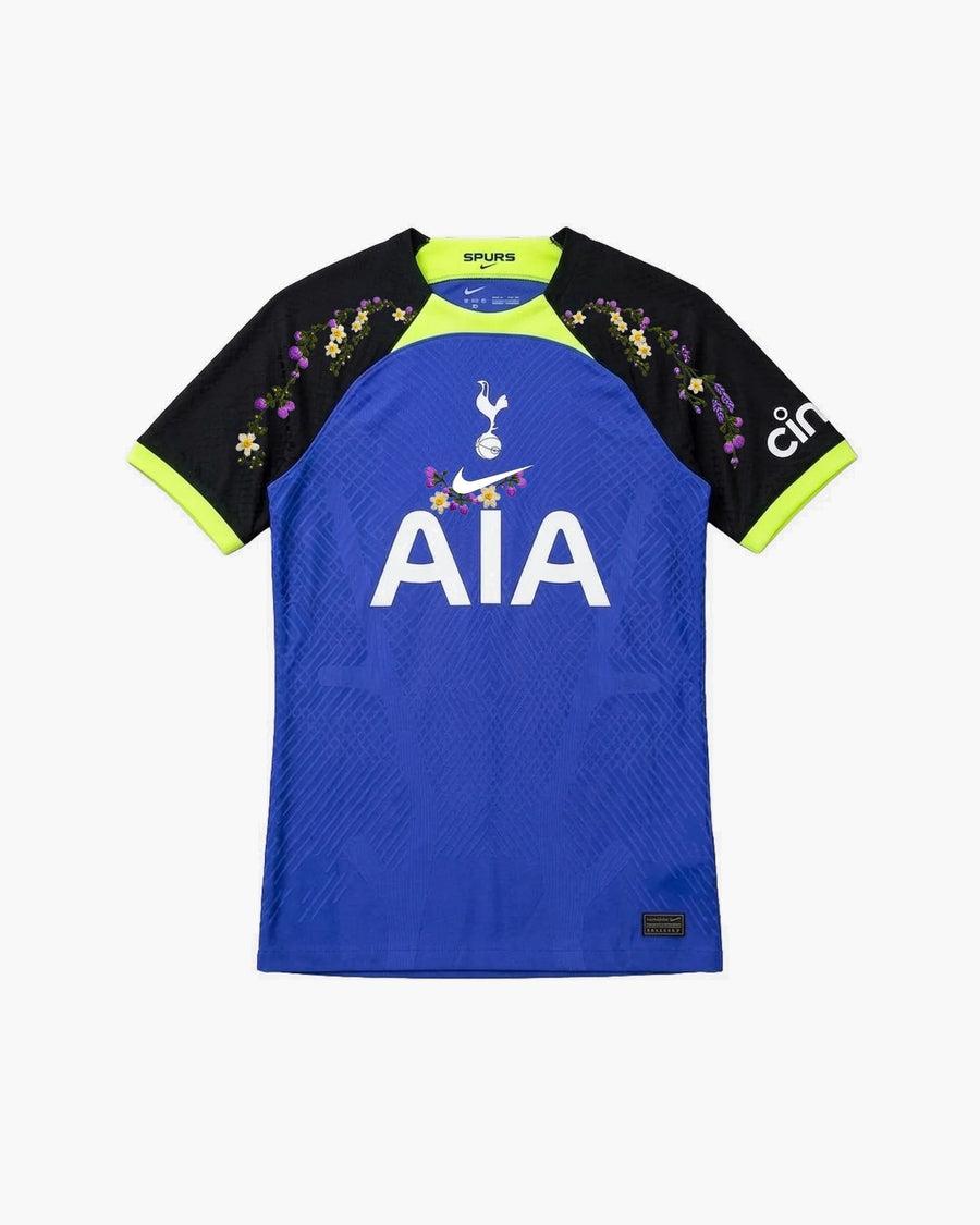 Tottenham hand-embroidered football shirt in blue / black, front view — CRID